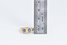 Load image into Gallery viewer, 10K Oval Yellow Sapphire Tanzanite Diamond Halo Ring Yellow Gold