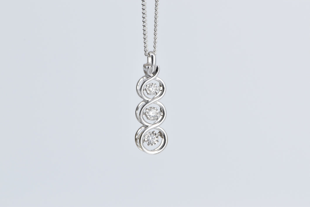 10K Tiered Dancing Diamond Three Stone Twist Pendant White Gold
