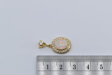 Load image into Gallery viewer, 14K Oval Natural Opal 0.30 Ctw Diamond Halo Vintage Pendant Yellow Gold