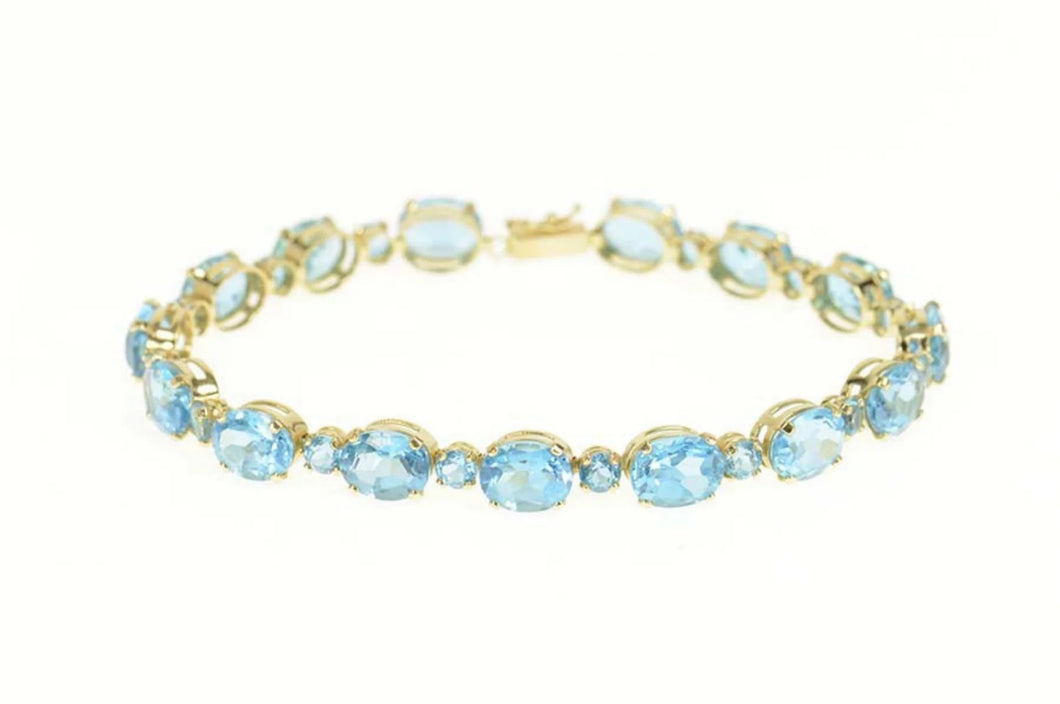 14K Oval Blue Topaz Statement Classic Bracelet 8