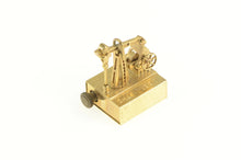 Load image into Gallery viewer, 14K Articulated Oil Rig Heart of Texas Working Music Box Yellow Gold