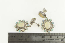 Load image into Gallery viewer, 14K Ornate Classic Oval Natural Opal Halo Dangle Earrings White Gold