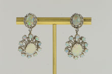 Load image into Gallery viewer, 14K Ornate Classic Oval Natural Opal Halo Dangle Earrings White Gold