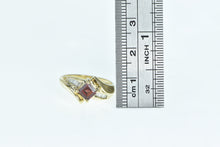 Load image into Gallery viewer, 10K Princess Garnet Baguette Diamond Bypass Ring Yellow Gold