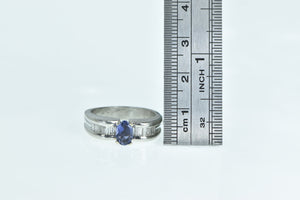 Platinum Oval Tanzanite Baguette Diamond Engagement Ring