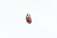 Load image into Gallery viewer, 10K Single Oval Syn. Ruby Diamond Accent Stud Earring Yellow Gold