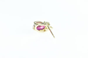 10K Single Oval Syn. Ruby Diamond Accent Stud Earring Yellow Gold