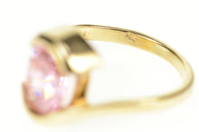 Load image into Gallery viewer, 10K Oval Pink Cubic Zirconia Solitaire Bypass Ring Size 6.5 Yellow Gold