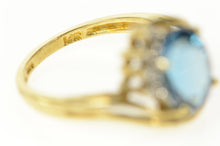 Load image into Gallery viewer, 14K Blue Topaz Diamond Accent Orante Bypass Ring Size 6 Yellow Gold