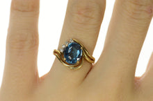 Load image into Gallery viewer, 14K Blue Topaz Diamond Accent Orante Bypass Ring Size 6 Yellow Gold