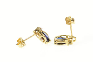 14K Oval Syn. Sapphire CZ Accent Stud Earrings Yellow Gold