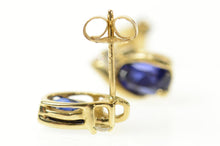 Load image into Gallery viewer, 14K Oval Syn. Sapphire CZ Accent Stud Earrings Yellow Gold