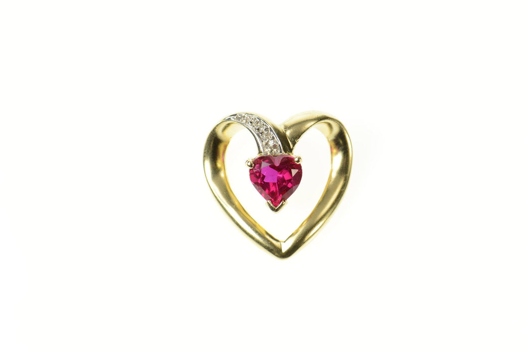10K Heart Syn. Ruby Diamond Accent Curvy Pendant Yellow Gold