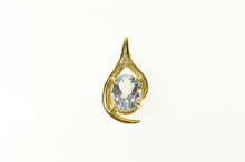 Load image into Gallery viewer, 10K Oval Blue Topaz Diamond Accent Statement Pendant Yellow Gold