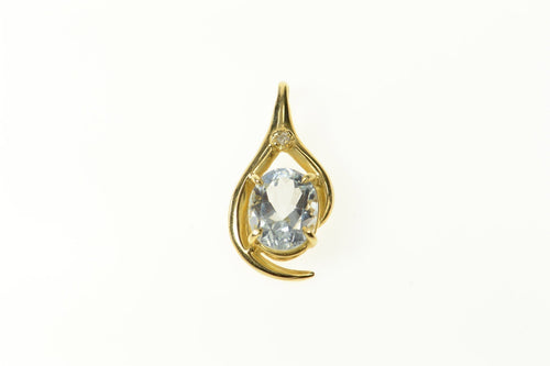 10K Oval Blue Topaz Diamond Accent Statement Pendant Yellow Gold