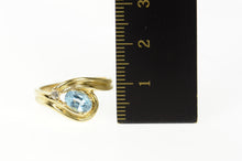 Load image into Gallery viewer, 14K Ornate Blue Topaz Diamond Wavy Bypass Ring Size 6.75 Yellow Gold
