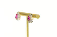 Load image into Gallery viewer, 10K Oval Syn. Ruby CZ Halo Classic Screw Back Earrings Yellow Gold