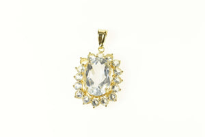 14K Oval Syn. Blue Topaz Halo Statement Pendant Yellow Gold