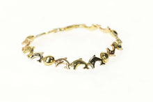 Load image into Gallery viewer, 10K Tri Tone Dolphin Link Beach Ocean Motif Bracelet 6.75&quot; Yellow Gold