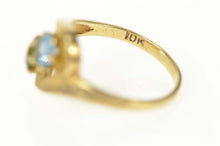 Load image into Gallery viewer, 10K 1960&#39;s Blue Topaz Peridot Textured Bypass Ring Size 2.5 Yellow Gold