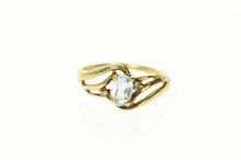 Load image into Gallery viewer, 10K Oval Blue Topaz Diamond Accent Wavy Ring Size 5.5 Yellow Gold