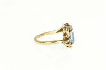 Load image into Gallery viewer, 10K Emerald Cut Blue Topaz Synthetic Ruby Bypass Ring Size 6 Yellow Gold