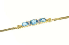 Load image into Gallery viewer, 14K Blue Topaz Diamond Herringbone Tennis Bracelet 6&quot; Yellow Gold