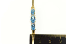 Load image into Gallery viewer, 14K Blue Topaz Diamond Herringbone Tennis Bracelet 6&quot; Yellow Gold