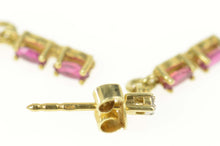 Load image into Gallery viewer, 14K Oval Natural Ruby Dangle Diamond Accent Earrings Yellow Gold