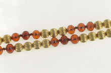 Load image into Gallery viewer, 14K Retro Grooved Sim. Amber Beaded Opera Necklace 32&quot; Yellow Gold