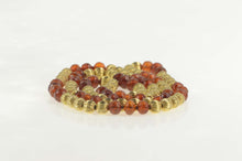 Load image into Gallery viewer, 14K Retro Grooved Sim. Amber Beaded Opera Necklace 32&quot; Yellow Gold