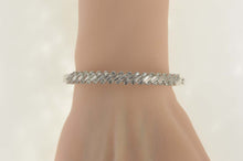 Load image into Gallery viewer, Sterling Silver Baguette &amp; Round Cubic Zirconia Bangle Bracelet 7&quot;