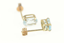Load image into Gallery viewer, 10K Oval Blue Topaz Classic Solitaire Stud Earrings Yellow Gold