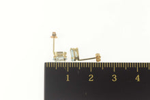 Load image into Gallery viewer, 10K Oval Blue Topaz Classic Solitaire Stud Earrings Yellow Gold