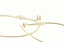 Load image into Gallery viewer, 14K Pearl Beaded Oval Spiral Accent Hoop Earrings Yellow Gold