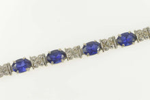 Load image into Gallery viewer, 10K Oval Syn. Sapphire Diamond Accent Tennis Bracelet 7.25&quot; White Gold
