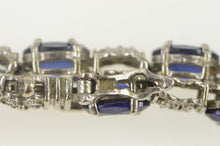 Load image into Gallery viewer, 10K Oval Syn. Sapphire Diamond Accent Tennis Bracelet 7.25&quot; White Gold