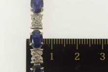Load image into Gallery viewer, 10K Oval Syn. Sapphire Diamond Accent Tennis Bracelet 7.25&quot; White Gold
