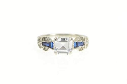 Sterling Silver Asscher Syn. Sapphire Ornate Travel Engagement Ring