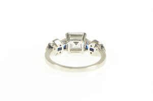 Sterling Silver Asscher Syn. Sapphire Ornate Travel Engagement Ring