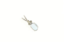 Load image into Gallery viewer, 14K Oval Blue Topaz Diamond Cluster Accent Pendant White Gold