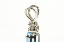 Load image into Gallery viewer, 14K Oval Blue Topaz Diamond Cluster Accent Pendant White Gold