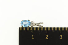 Load image into Gallery viewer, 14K Oval Blue Topaz Diamond Cluster Accent Pendant White Gold