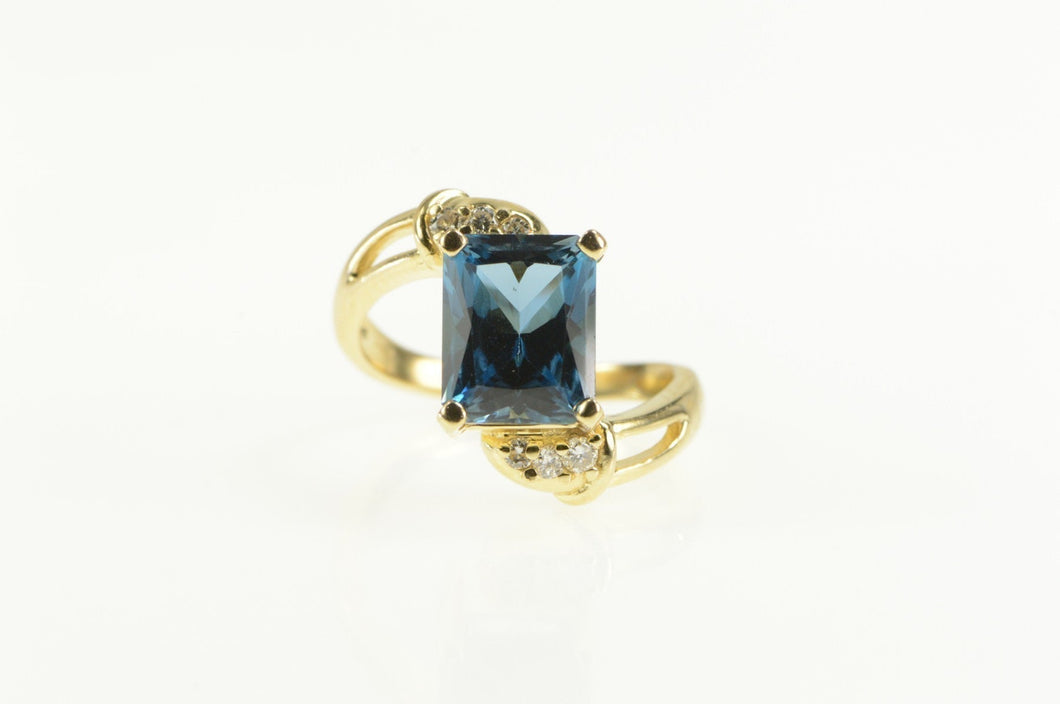 14K Emerald Cut Blue Topaz Diamond Bypass Ring Yellow Gold