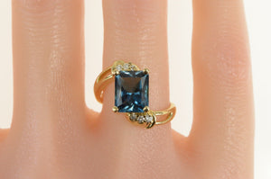14K Emerald Cut Blue Topaz Diamond Bypass Ring Yellow Gold