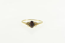 Load image into Gallery viewer, 14K 0.63 Ctw Oval Garnet Diamond Accent Ring Yellow Gold