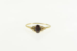14K 0.63 Ctw Oval Garnet Diamond Accent Ring Yellow Gold