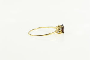 14K 0.63 Ctw Oval Garnet Diamond Accent Ring Yellow Gold
