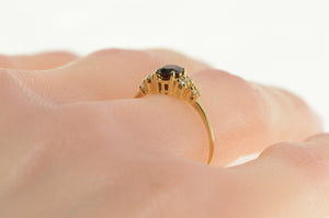 14K 0.63 Ctw Oval Garnet Diamond Accent Ring Yellow Gold