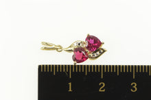 Load image into Gallery viewer, 10K Two Syn. Ruby Heart Love Symbol Diamond Charm/Pendant Yellow Gold